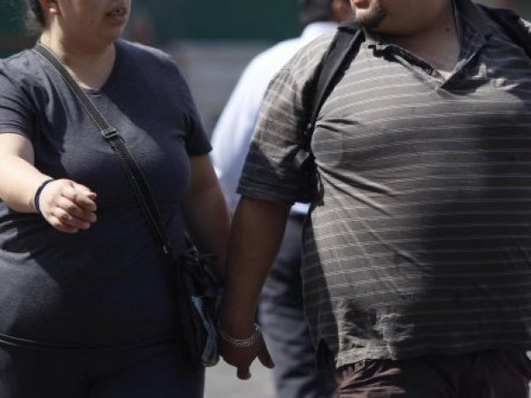 Personas con sobrepeso. Estudio sobre obesidad y cáncer.