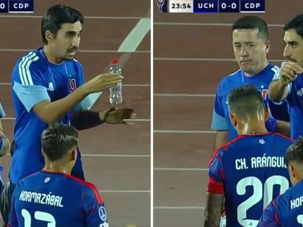 Francisco Meneghini dando instrucciones a los jugadores de la Universidad de Chile